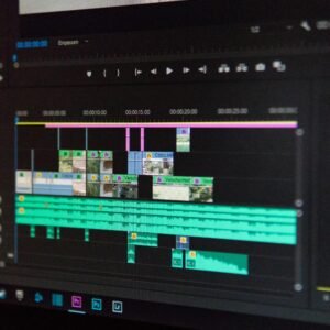 Close-up of a video editing timeline interface on a computer screen, showcasing professional software in action.